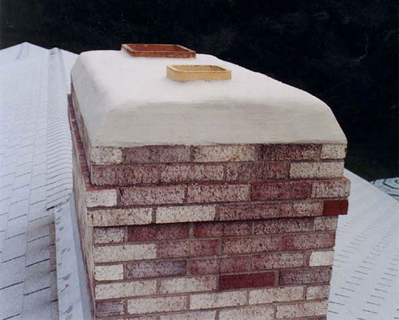 Traditions Chimney Sweeps after CrownSeal applied white clean and ready to go. Two flues.